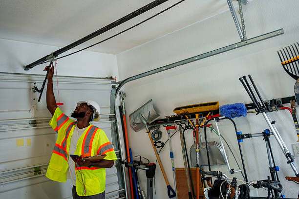 Professional Garage Door Panel Replacement technician working in Vandenberg Village, CA